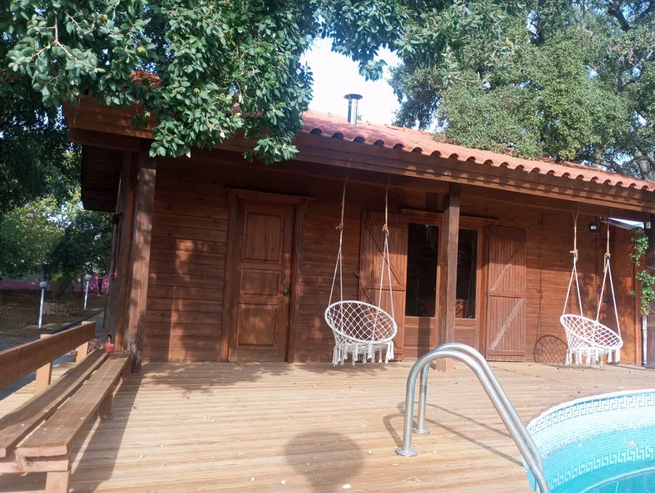 Main house entrance and surrounding trees